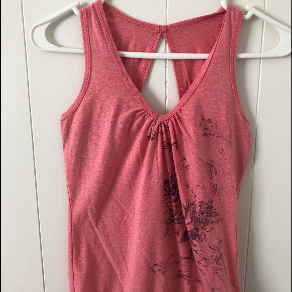 flower on pink sleeveless top